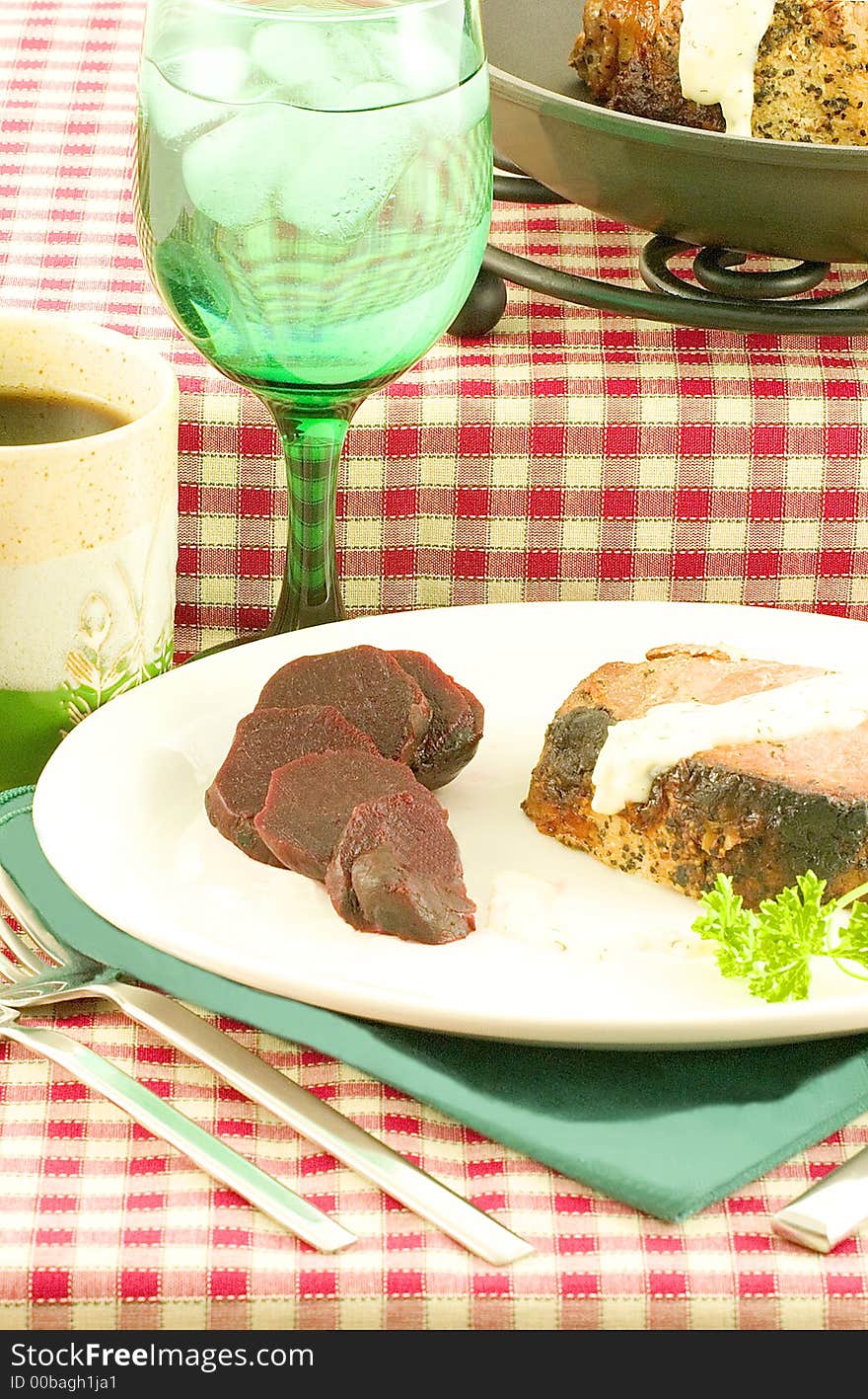 Pork tenderloin served with a white sauce seasoned with salt,pepper and dill.