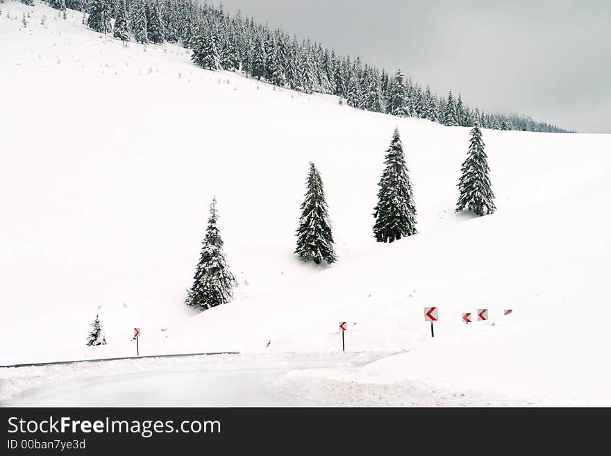 Dangerous road curves in winter time. Dangerous road curves in winter time