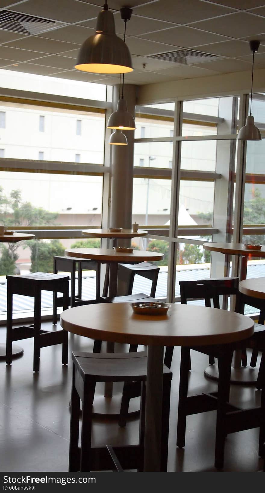 Tables with ash trays in a restaurant.