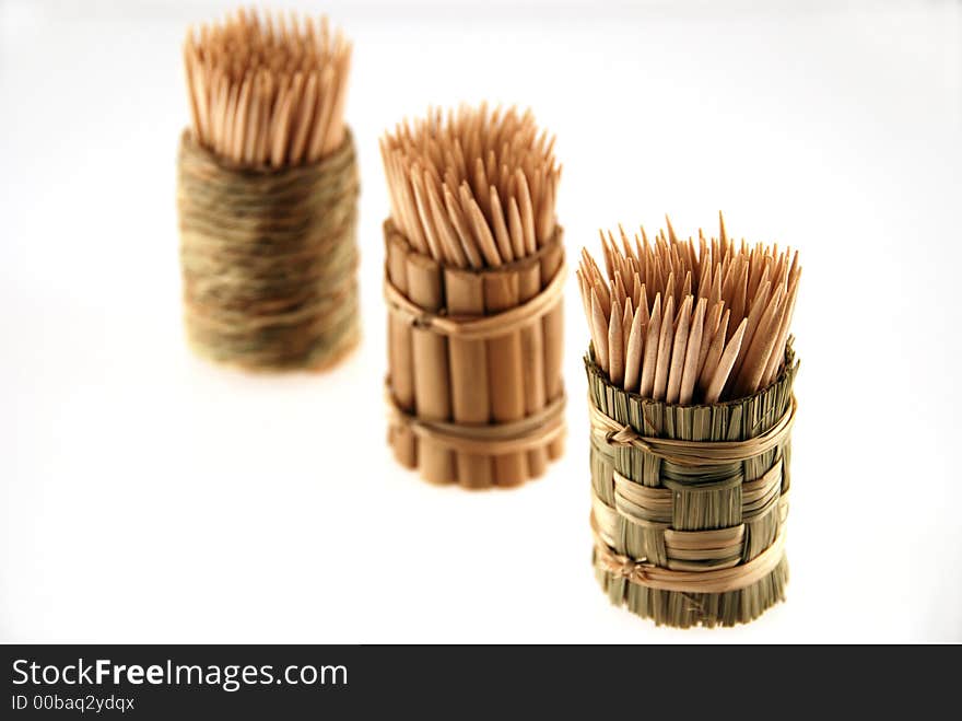 Simple wooden toothpicks with white background