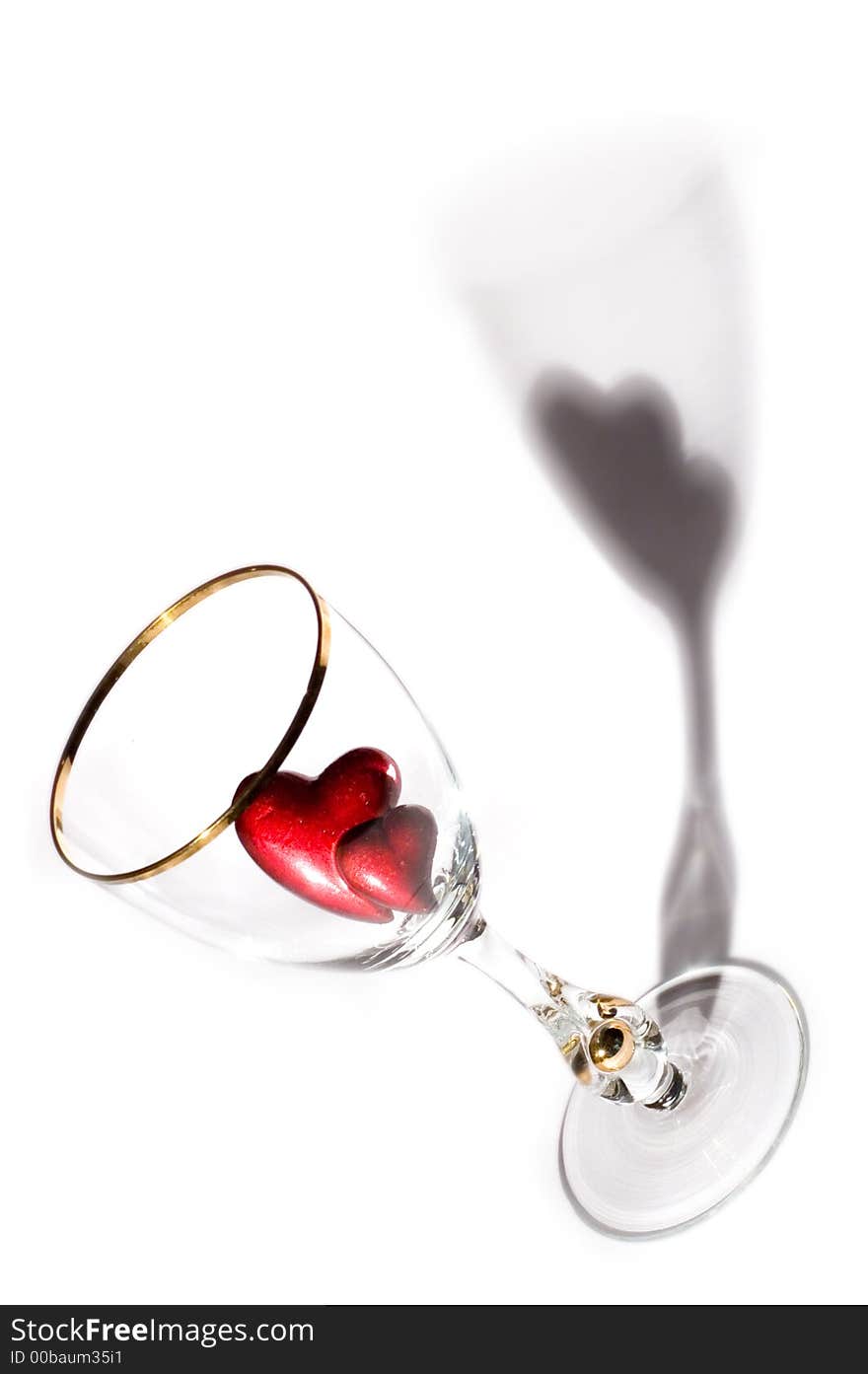 Picture of a glass with two hearts inside. Picture of a glass with two hearts inside