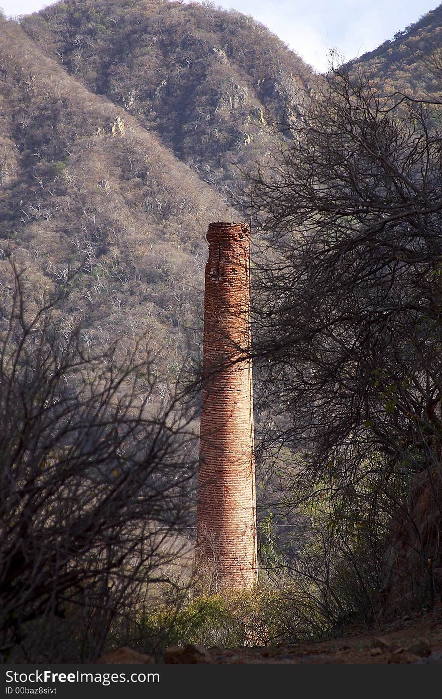 Abandoned chimeney of a factory  in the town of Alamos, in the northern state of Sonora, Mexico, Latin America