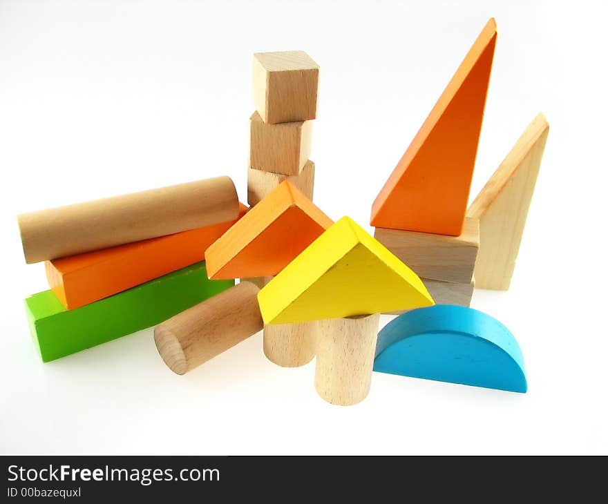 Wood color toy blocks on the white background