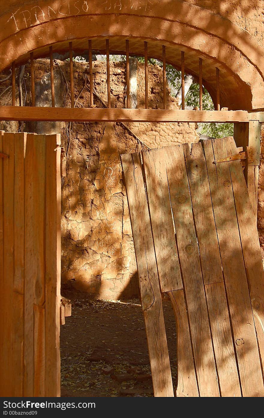 Entrance door of one of the abandoned houses made out of adobe in the town of Alamos, in the northern state of Sonora, Mexico, Latin America