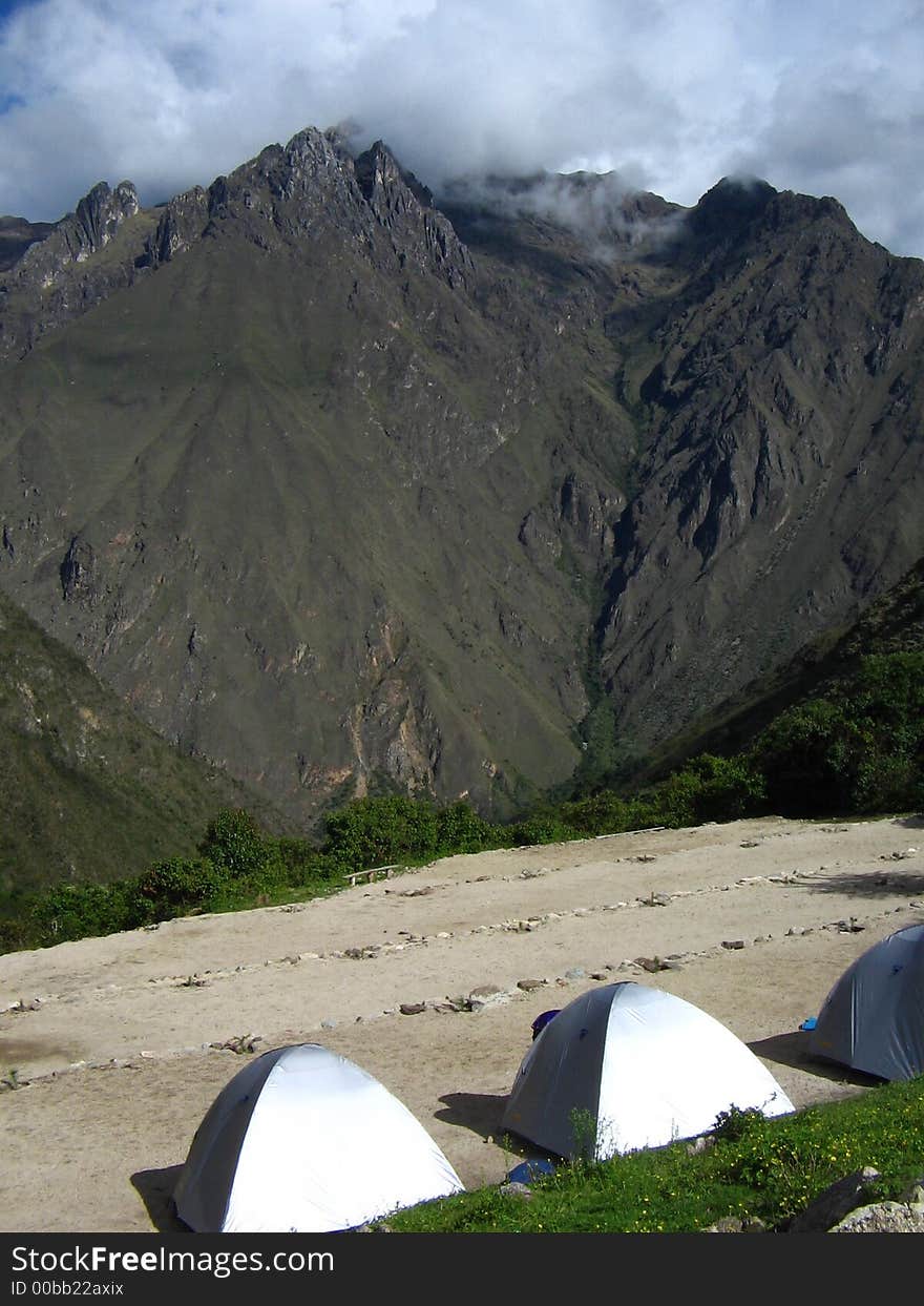 Silver tents camping on high ground