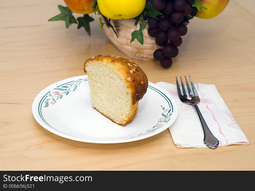 Half a banana nut muffin for a quick snack with fruit. Half a banana nut muffin for a quick snack with fruit