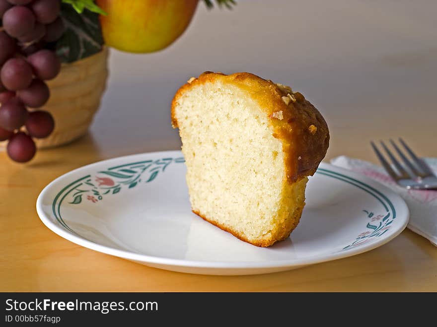 Half a banana nut muffin for a quick snack with fruit. Half a banana nut muffin for a quick snack with fruit