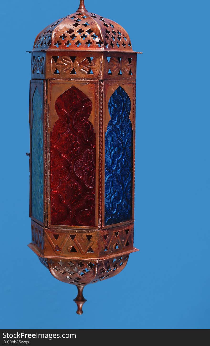 Exotic lamp on blue background