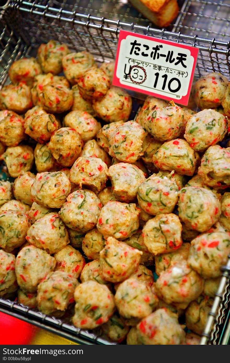 Tasty japanese fish cakes in fresh market, Kyoto.