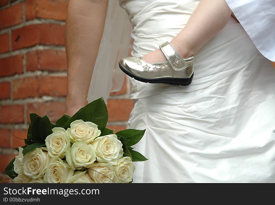 Bride, child and flowers