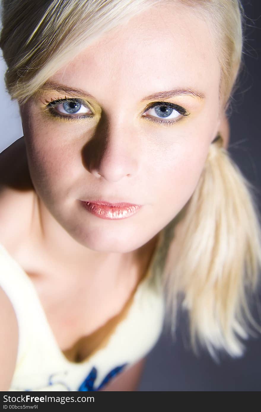 A model posing in the photo studio. A model posing in the photo studio