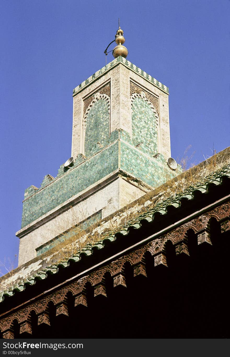 Minaret of the mosque of the religious university of Meknes, Morocco. Minaret of the mosque of the religious university of Meknes, Morocco.