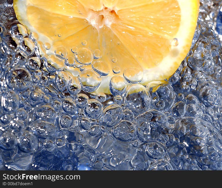 Fresh lemon in the water. Fresh lemon in the water