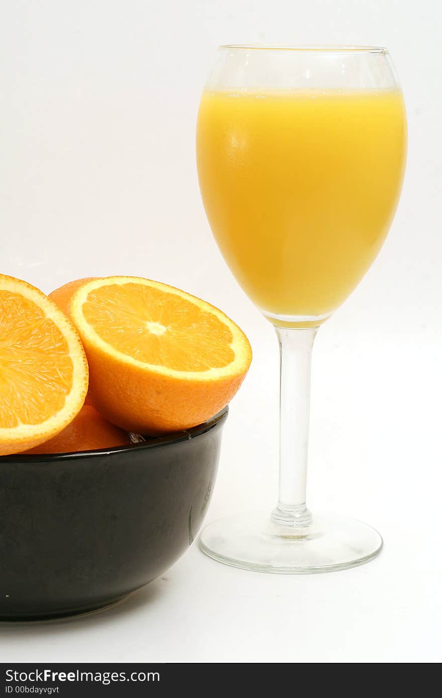 Oranges & OJ on white upclose