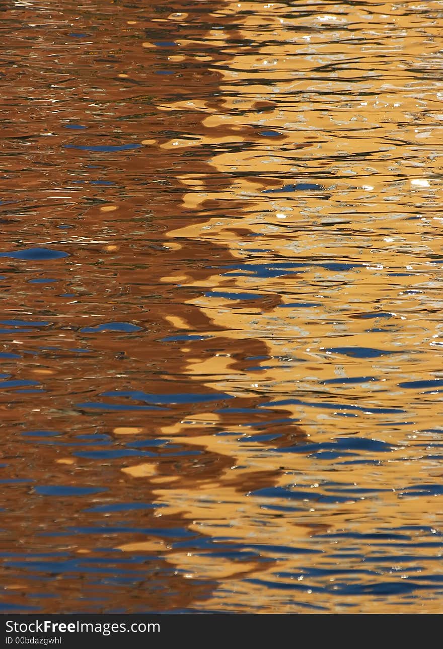 Reflection from houses on quay in the river. Reflection from houses on quay in the river