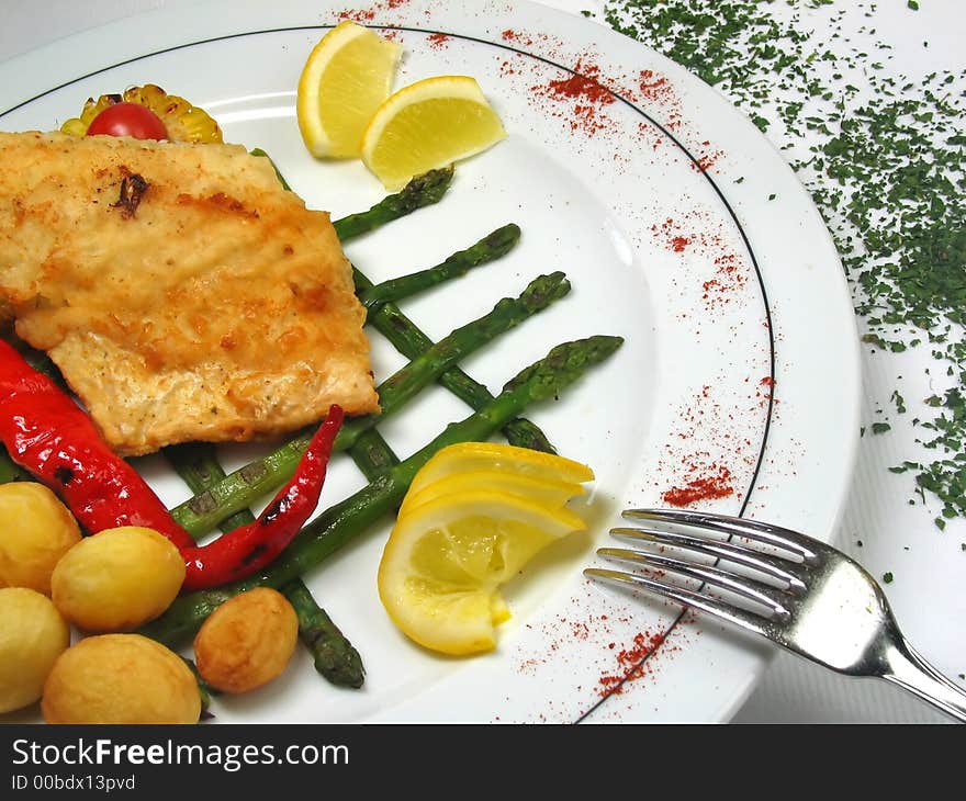 Oven fillet and potatoes on the decorated plate