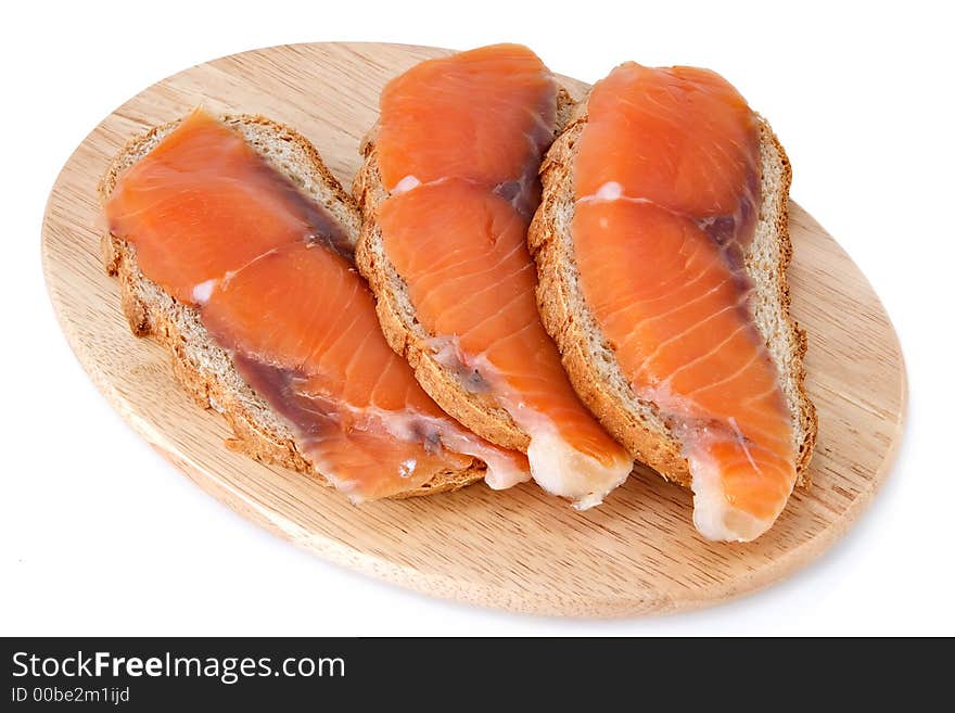 Juicy snack from slices salty salmon and crispbread. Juicy snack from slices salty salmon and crispbread