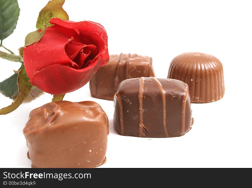 Shot of chocolate & a red rose. Shot of chocolate & a red rose