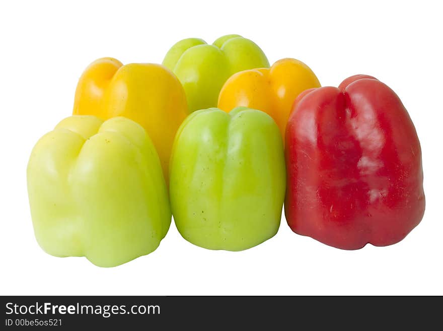 Group of red,green and yellow bellpeppers over white