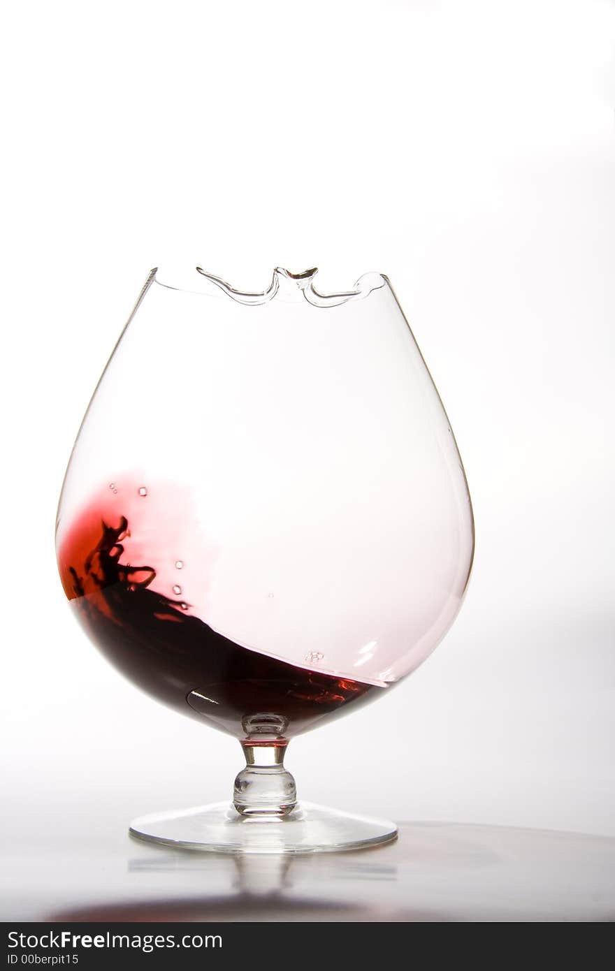 Red wine swirling in decanter