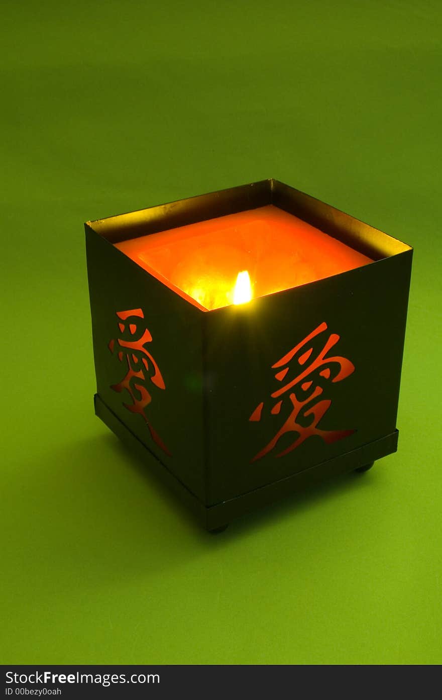 Candle With Hieroglyph On Green