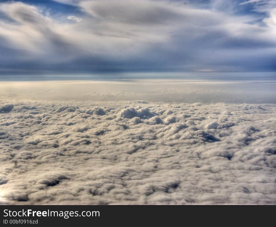 View on storm clouds from above point. It was a heavy rain down below at this moment. View on storm clouds from above point. It was a heavy rain down below at this moment.