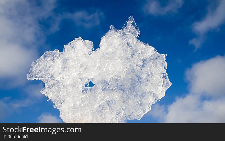 Bit of ice on sky background