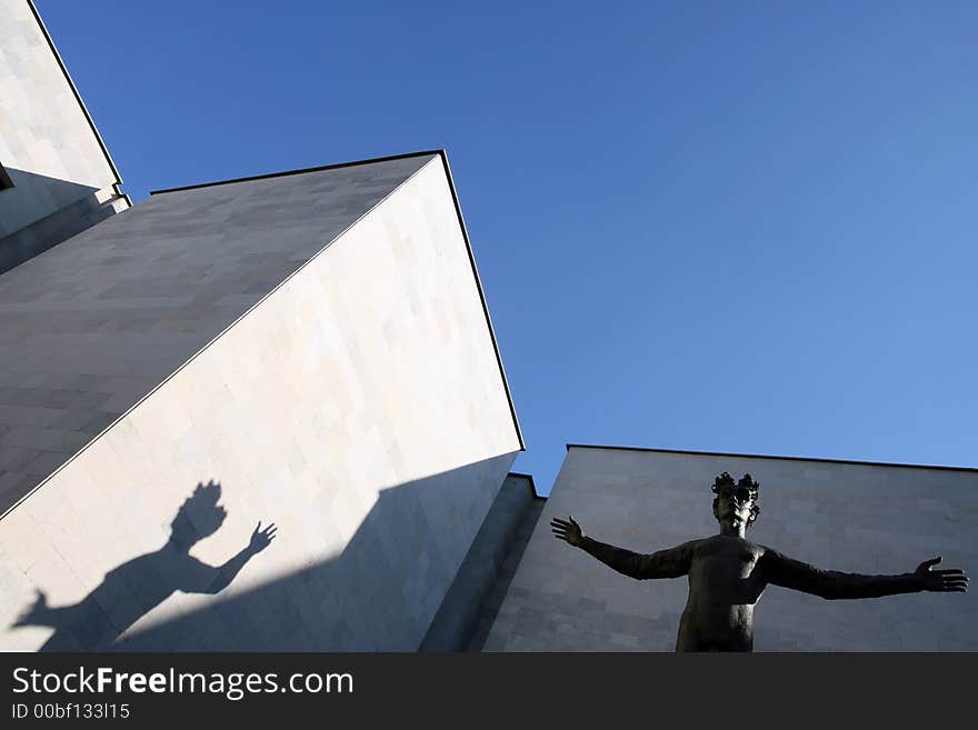 Boy's statue and its shadow. Boy's statue and its shadow