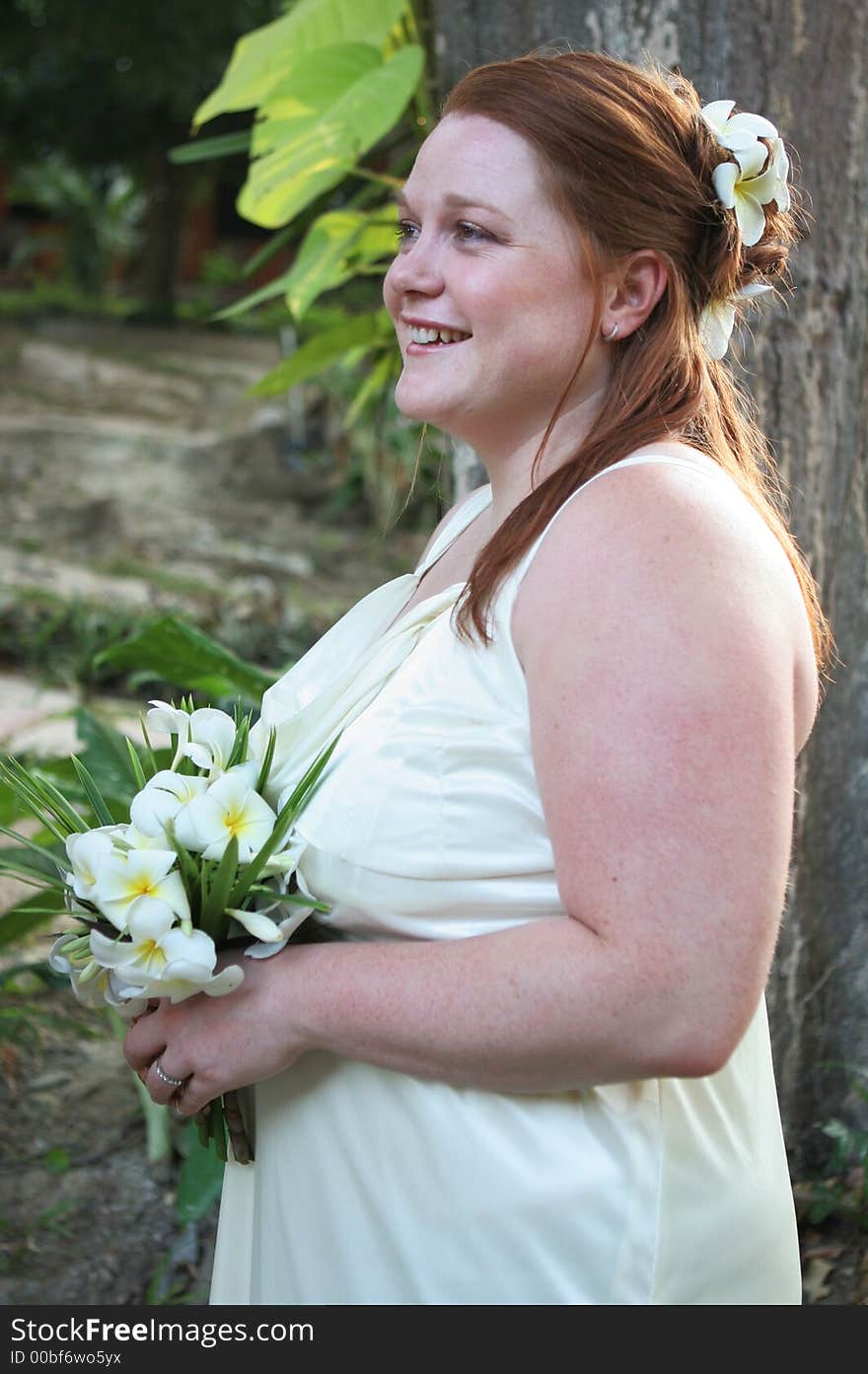 Gorgeous bride holding a bouquet. Gorgeous bride holding a bouquet