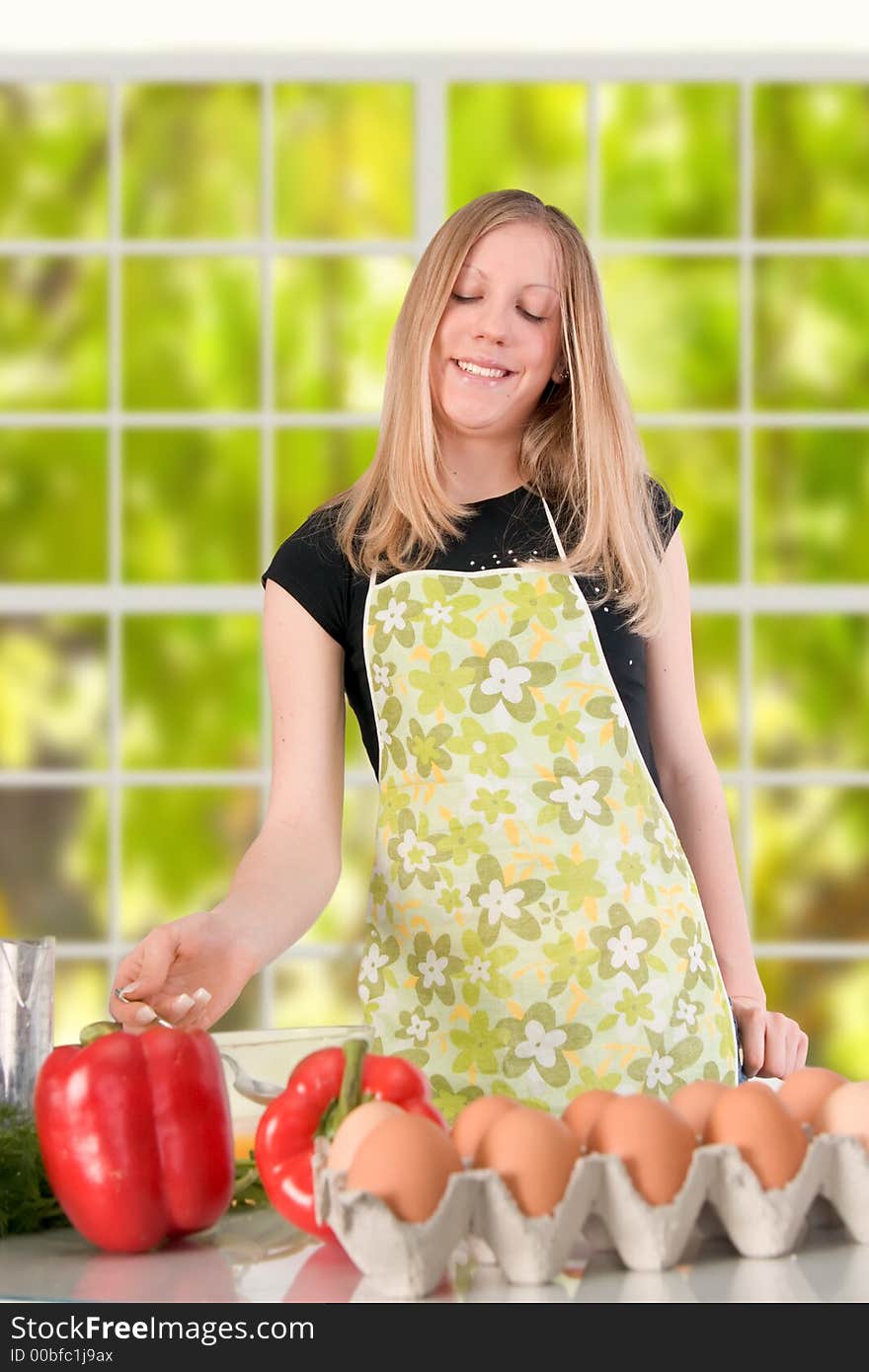 Girl preparing food in the kitchen.