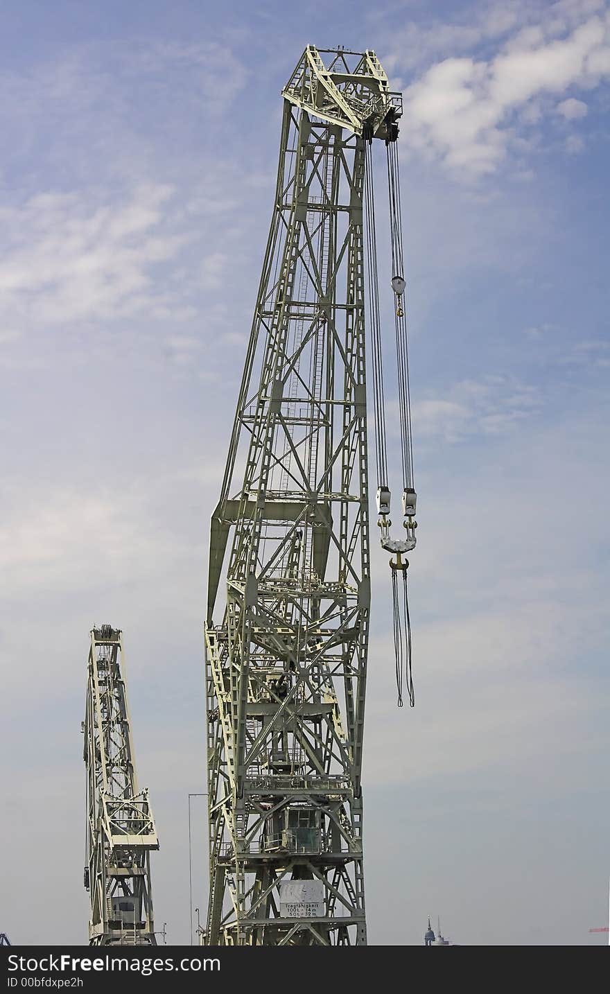 Two old cranes in the harbour of hamburg. Two old cranes in the harbour of hamburg