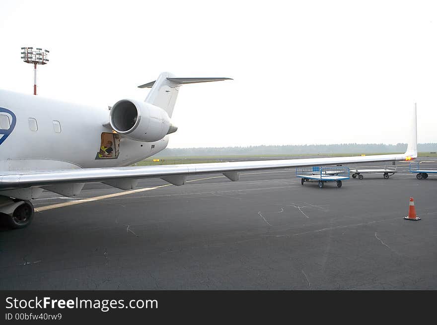 Airplane's airfoil on the runway. Airplane's airfoil on the runway