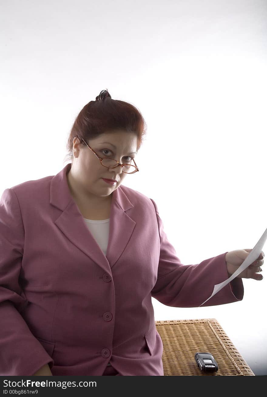 Business woman discussing a report. Business woman discussing a report