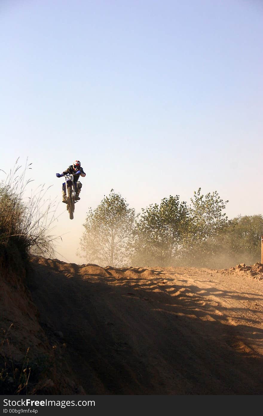 Motor bike. Jump on the course.