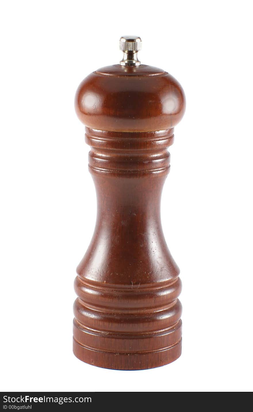 Wooden pepper mill isolated over white background