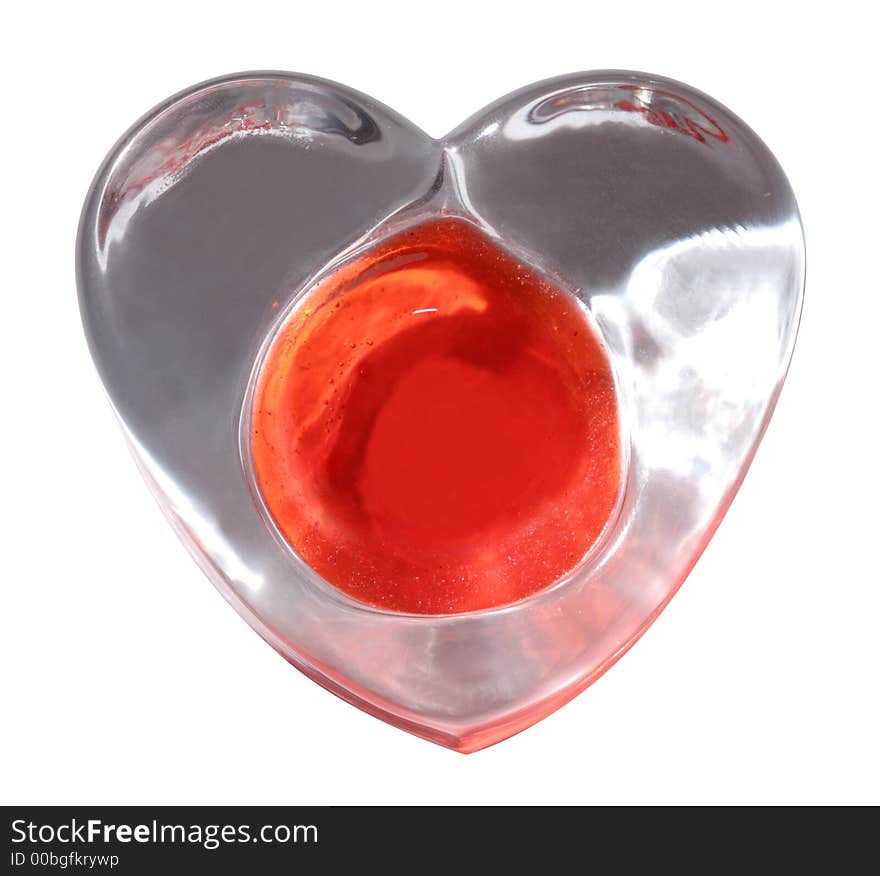 Candle shaped like a heart on the white background. Candle shaped like a heart on the white background