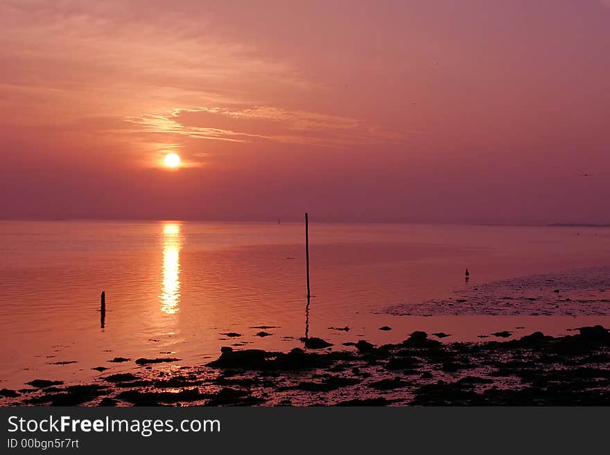 The great sunset colors near some beach