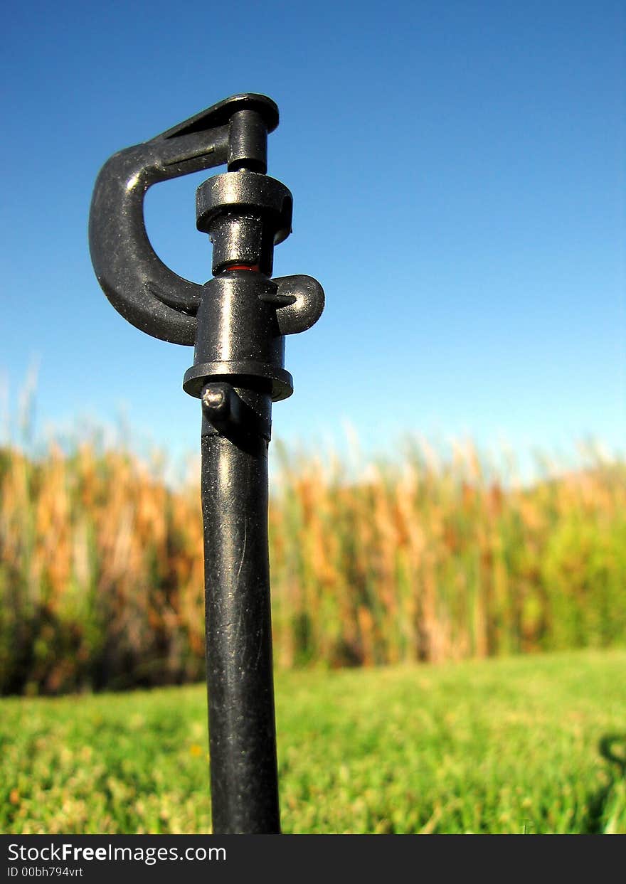 Portrait photo of a mini sprinkler head. Portrait photo of a mini sprinkler head