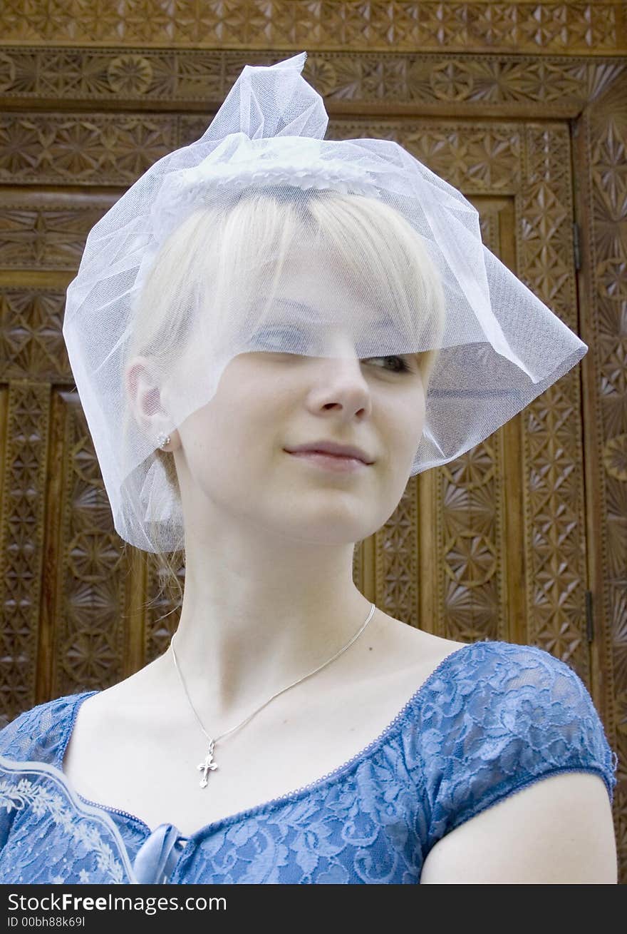 Young bride portrait before the church ceremony