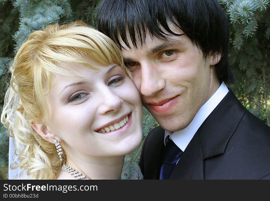 Young bride and groom portrait after the church ceremony