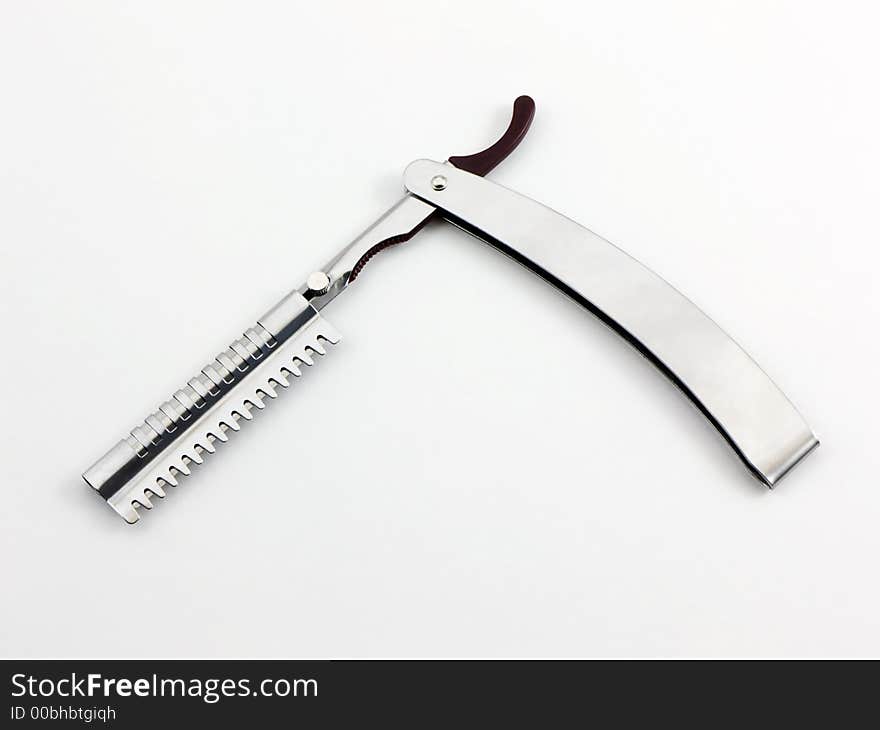 Photo of a feathering or straight razor. Photo of a feathering or straight razor