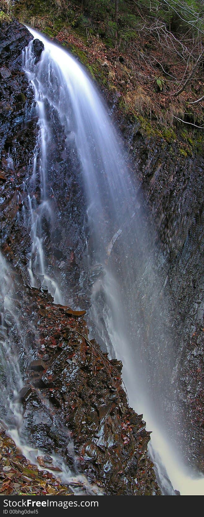 Carpathian Waterfall. The waterfall is located near to small town Yaremcha on inflow of the river Zhenets. Height of a falls about 12 meters. Carpathian Waterfall. The waterfall is located near to small town Yaremcha on inflow of the river Zhenets. Height of a falls about 12 meters.