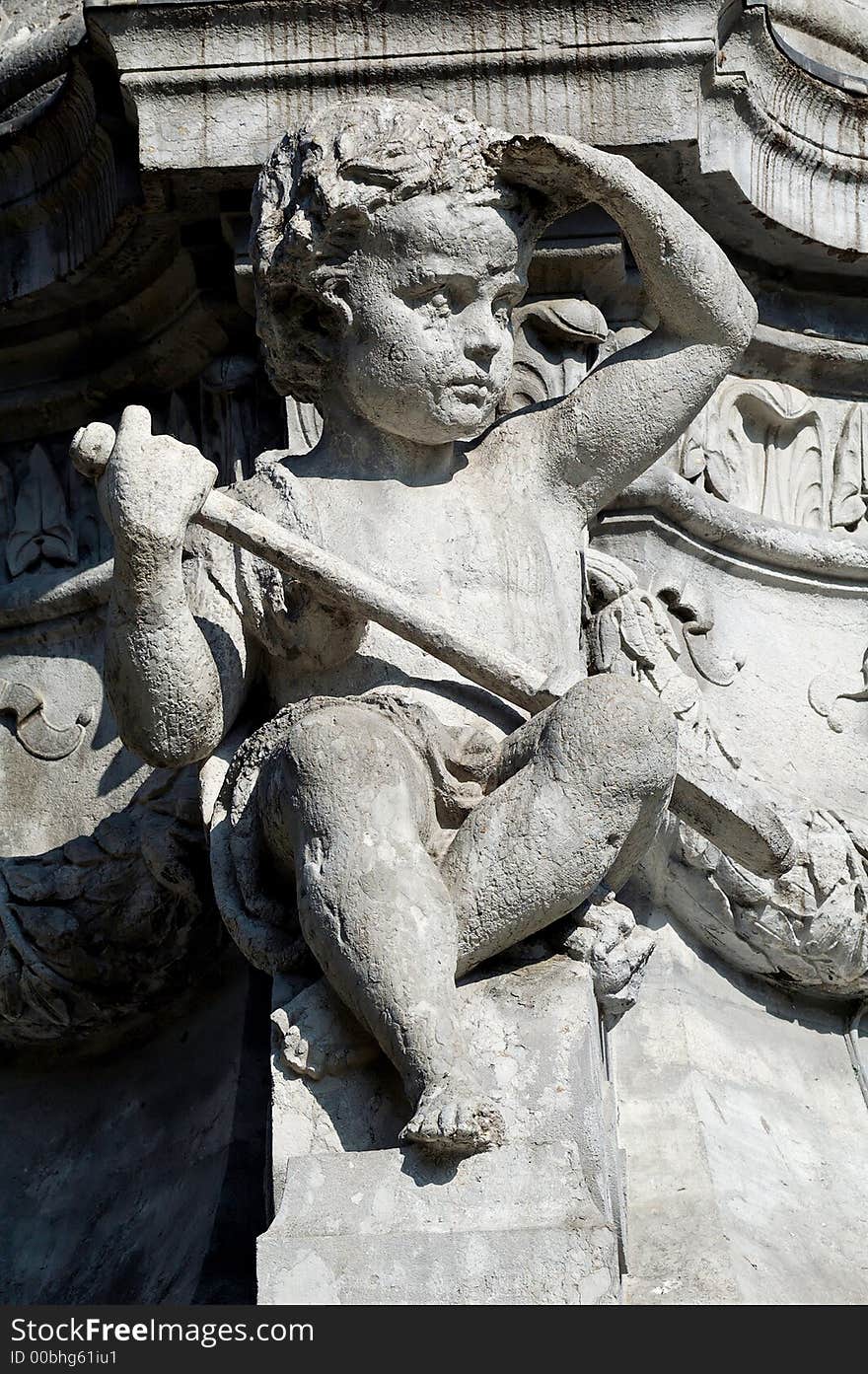 Close up of a granite carved child (1865)  - Place du Mal Lyautey - Lyon - France. Close up of a granite carved child (1865)  - Place du Mal Lyautey - Lyon - France