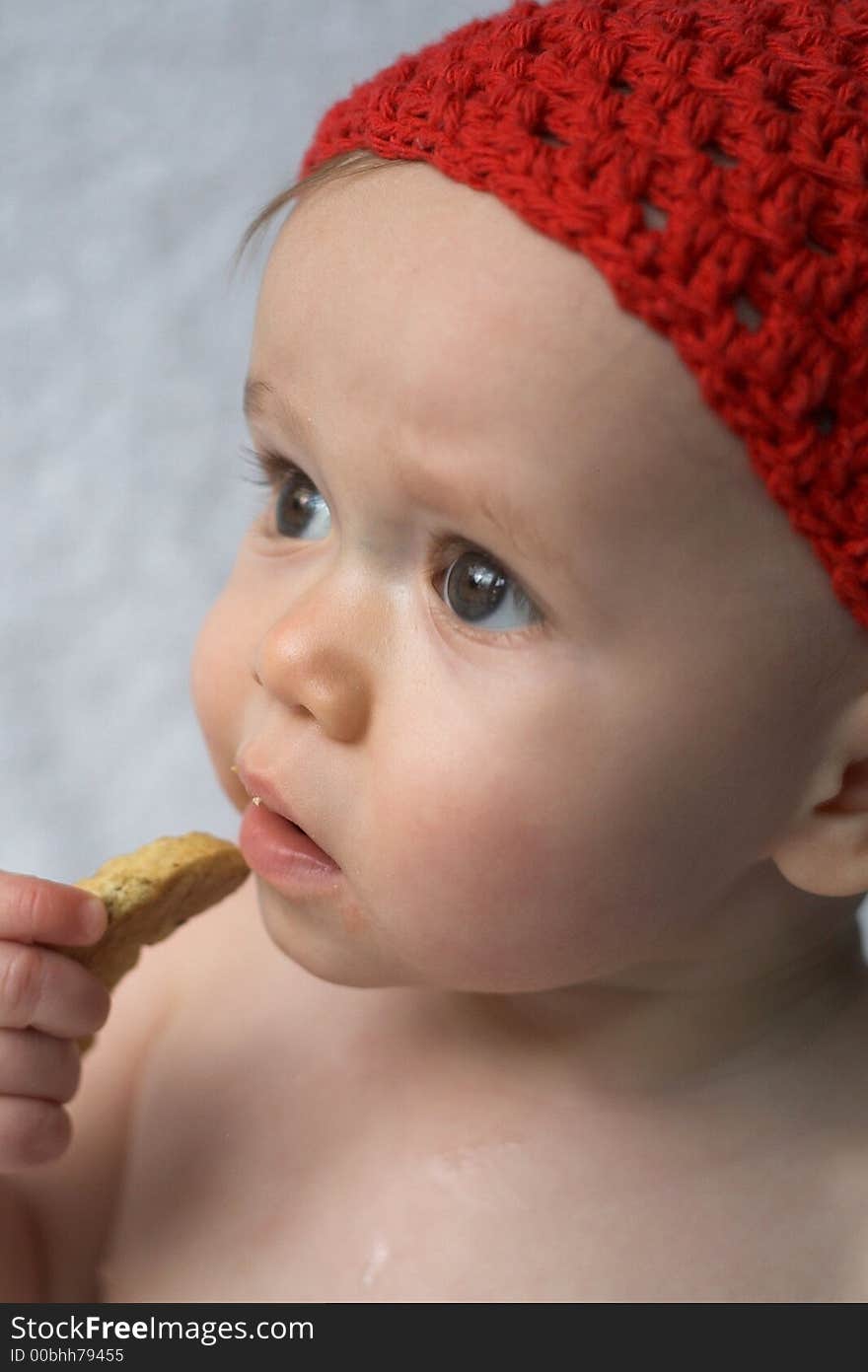 Image of baby eating a cookie. Image of baby eating a cookie