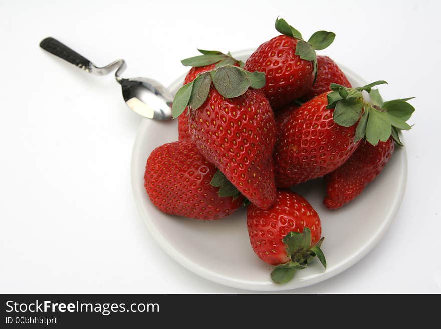 Group of the Strawberry on white plate. Group of the Strawberry on white plate