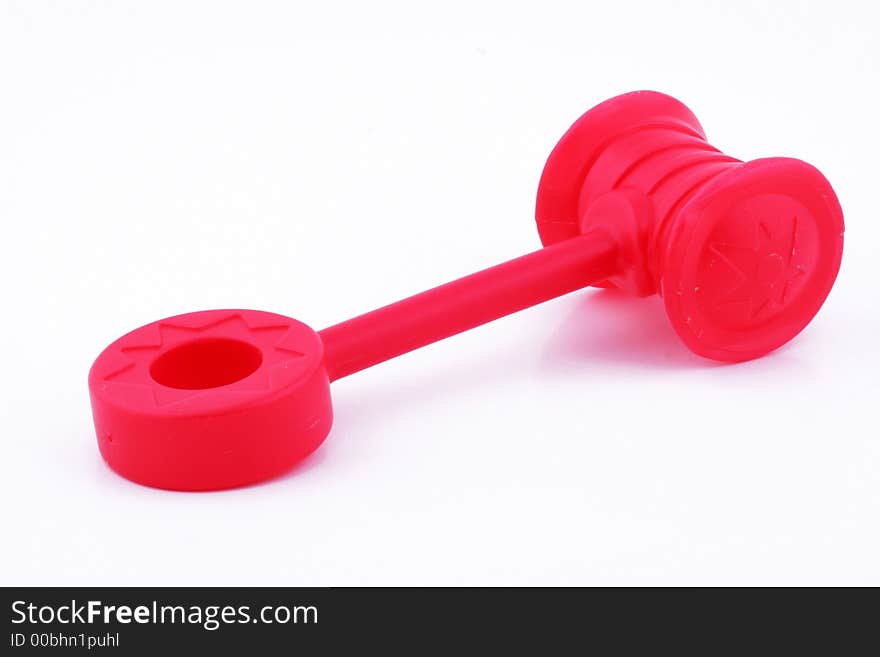 A red plastic toy hammer