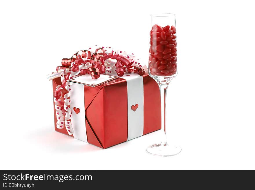 Valentine gift and champagne glass filled with candy. Valentine gift and champagne glass filled with candy.