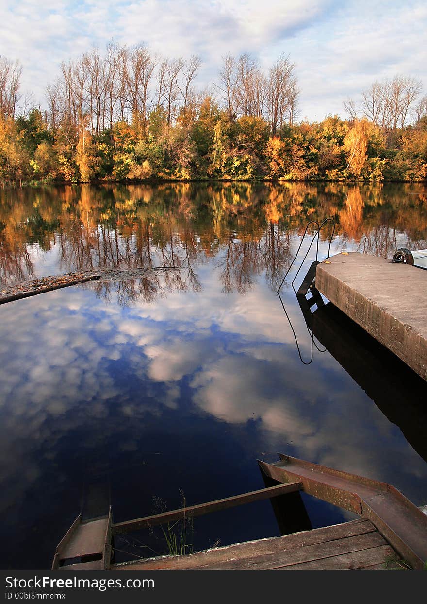 Autumn view about old river mooring. Autumn view about old river mooring