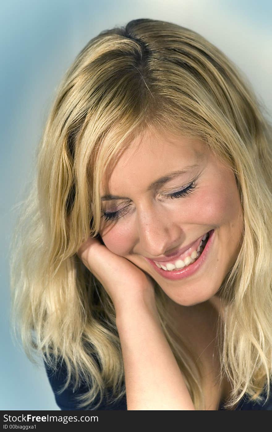 Portrait of a blond woman laughing. Portrait of a blond woman laughing