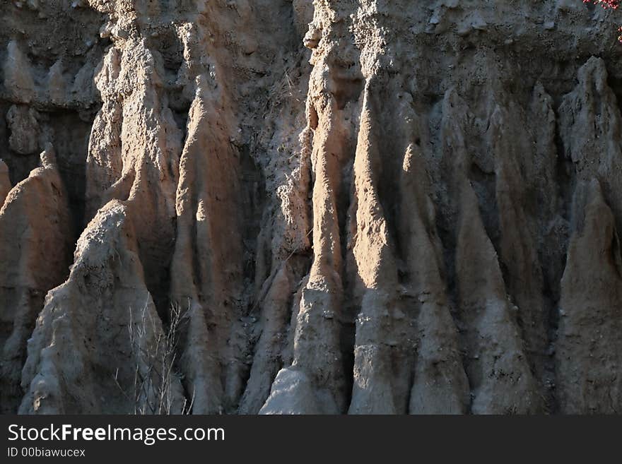 Orange colored dirt cliffs in California. Orange colored dirt cliffs in California